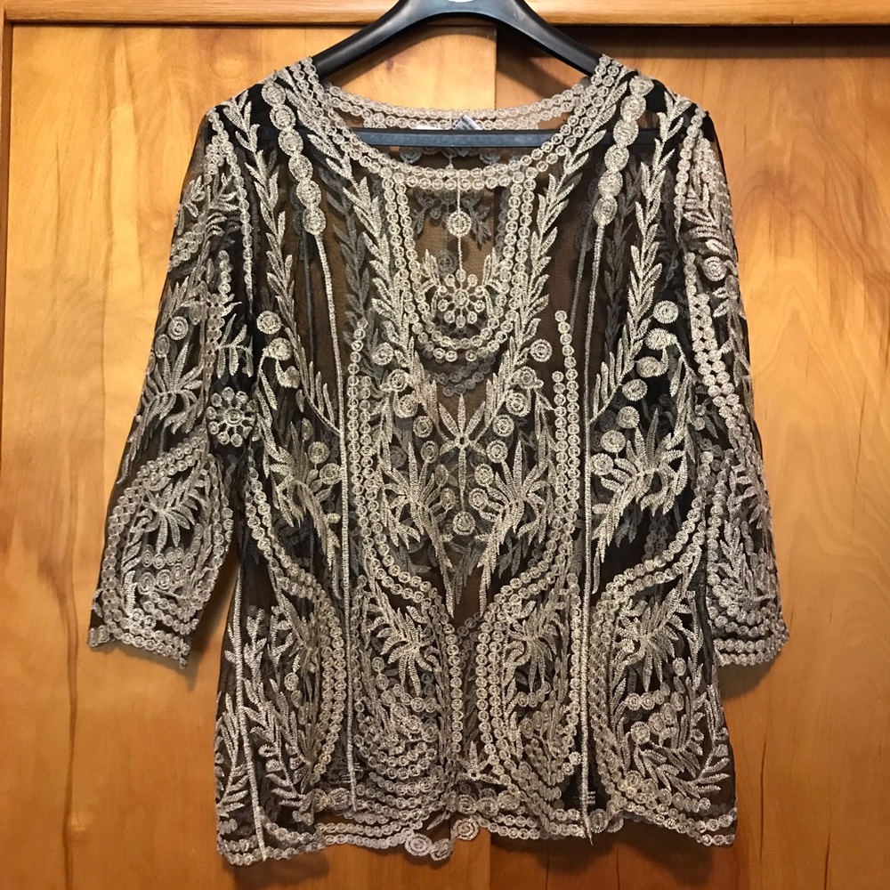 Large black and gold cover top